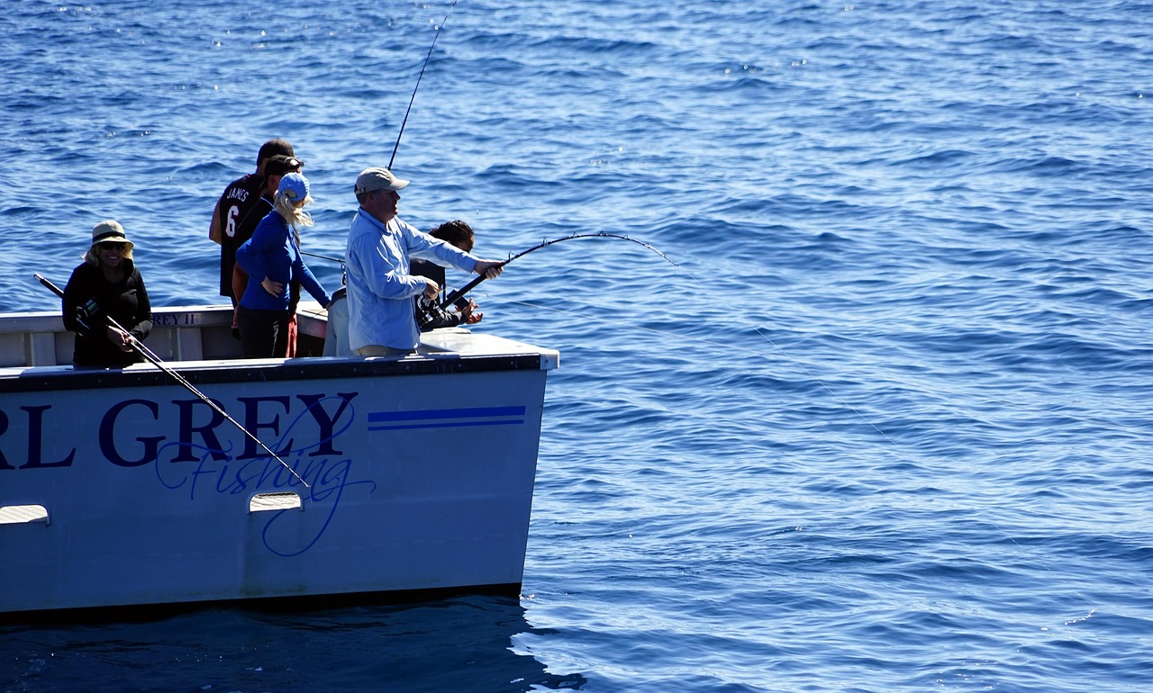 group of people deep sea fishing